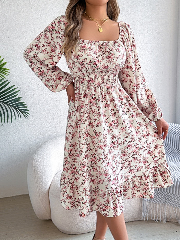 Kleid mit floralem Muster und Bindegürtel